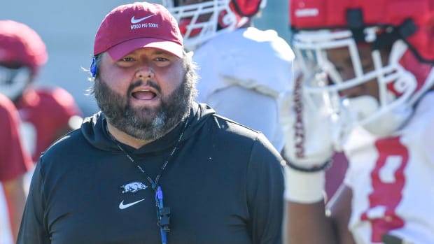 Razorbacks offensive line coach Cody Kennedy during drills Tuesday morning